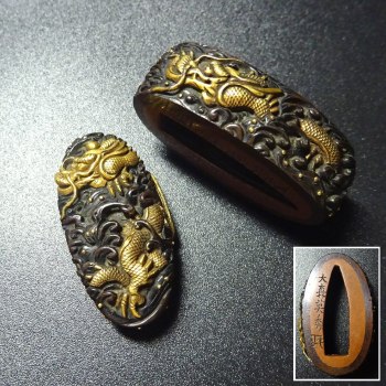 Exceptional Samurai Sword Fittings by Ōmori Hidehisa with Dragon and Waves Design